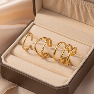 Three-piece gold plated stainless steel open ring set with geometric hollow designs