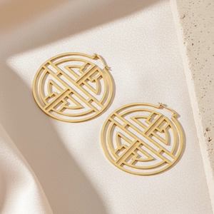 Exaggerated gold hollow round earrings in geometric stainless steel for women
