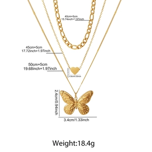 Detailed view of triple-layered butterfly and heart pendant necklace with dimensions