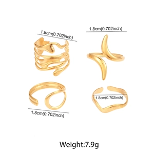 Detail of four-piece irregular gold rings set with diameter and weight measurements