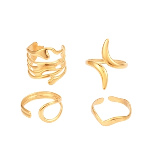 Set of four irregular geometric adjustable open rings in polished gold-plated finish