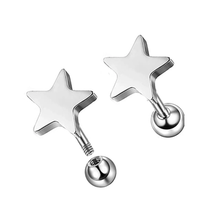 Macro detail of silver star studs showing screw-on ball back mechanism for piercings