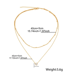 Détails du collier double couche doré avec perles et dimensions de la chaîne
