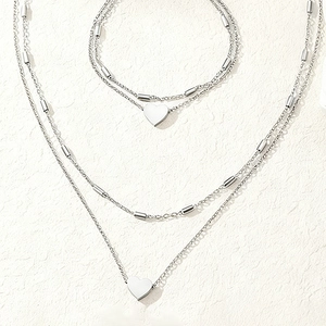 Ensemble collier et bracelet double couche en acier inoxydable avec pendentifs en cœur