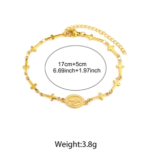 Detail of 18K gold plated bracelet with religious cross links and Virgin Mary medal