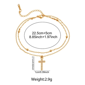 Détail de la chevillère en acier plaqué or 18K avec croix et dimensions précises