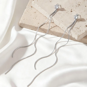 Elegant stainless steel tassel earrings featuring round zircon stones on minimalist wavy chains