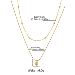Detail showing dimensions of a double-layered gold water drop beaded chain necklace