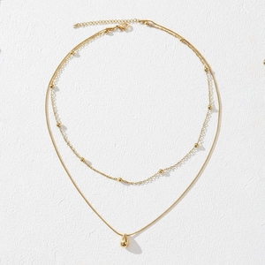 Double layer stainless steel necklace with gold beads and smooth teardrop pendant charm