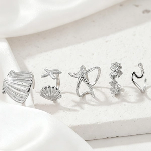 5-piece set of ocean-themed stainless steel rings featuring shell and starfish motifs