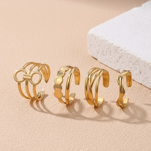 Set of 4 gold-plated adjustable rings with minimalist braided and knot patterns