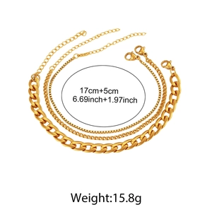 Detailed view of 18K gold plated chain set showing Cuban, bead, and box link patterns