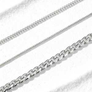 Three assorted silver stainless steel link chains including box and Cuban styles