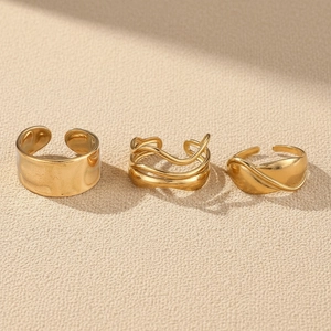 Three-piece set of 18k gold-plated stainless steel open rings with textured irregular designs