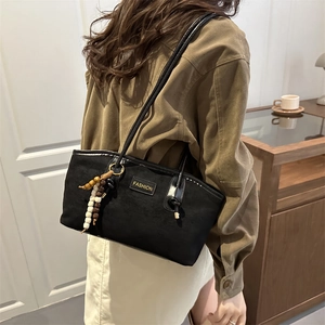 Chic black faux suede large tote bag for women with fashion patch and beaded charm accessory