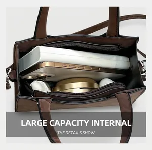 Vue de dessus du sac cabas en daim marron avec intérieur spacieux et compartiments de rangement