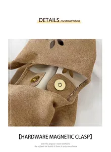 Détail du fermoir magnétique et motif floral découpé au laser sur le sac en daim marron