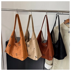 Detailed laser-cut floral patterns on large tote bags in four versatile autumn colors