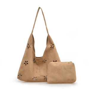 Large tan hobo tote bag with laser-cut floral patterns and a matching small zipper pouch