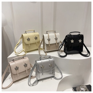 Mini sacs à main brillants en cinq couleurs avec rivets étoiles et poignées supérieures