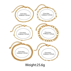 Detailed view of 6-piece gold chain bracelet set with bead, cuban, and paperclip links