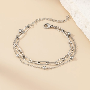 Bracelet double rang en acier inoxydable avec maille trombone et perles délicates