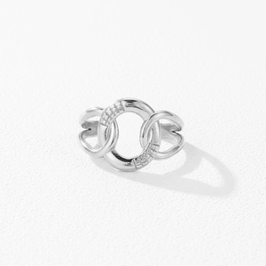 Intertwined triple-band silver ring featuring intricate grid textures and polished finish