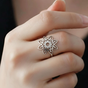 Hollow flower mandala ring in stainless steel with an open adjustable design for women