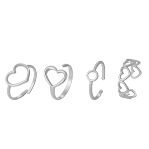 Silver hollow heart-shaped open ring set with four different minimalist band designs