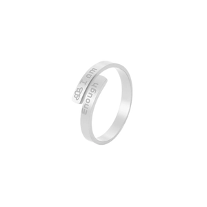Detail of engraved I am Enough quote and flower icon on silver adjustable steel ring