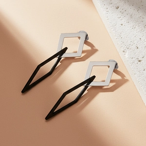 Irregular geometric metal tassel drop earrings in silver and black stainless steel
