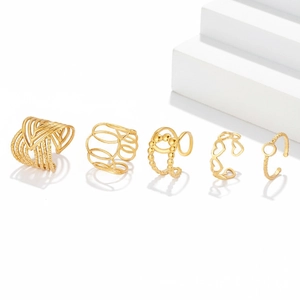 Set of five gold-plated ear cuffs featuring heart patterns and minimalist textured designs