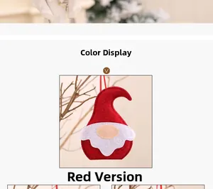 Détail d'un gnome de Noël nordique rouge suspendu à une branche en bois naturel