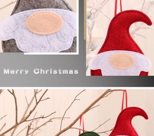 Détail de gnomes de Noël en feutre avec barbes blanches et cordes de suspension festives