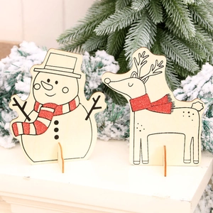 Christmas DIY wooden ornaments featuring snowman and reindeer with red glitter details