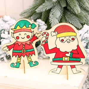 Christmas Santa and Elf wooden table ornaments with red sequins on a snowy background