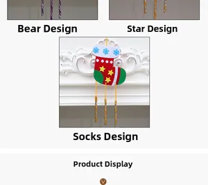 Detail of Christmas DIY felt wind chime socks with snowflake and star patterns
