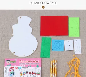 DIY Christmas snowman wind chime kit with felt pieces, metal tubes and pink instructions