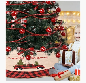 Classic Christmas tree skirt featuring a red truck pattern and Merry Christmas text detail