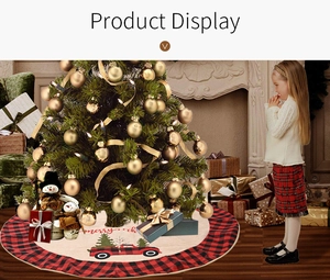 Detail of buffalo plaid Christmas tree skirt with vintage truck and Merry Christmas text