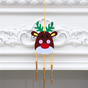 Handmade DIY Christmas reindeer wind chime with green antlers and festive metal tubes