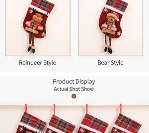 Detail of Christmas stockings with 3D elk and bear doll accents and red plaid fabric