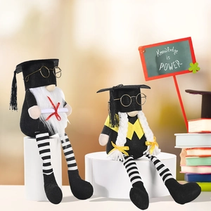 Handmade graduation gnomes with black caps, golden glasses and scrolls for desk decor