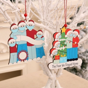 Wooden Christmas survivor ornaments featuring masked family and stay home text message
