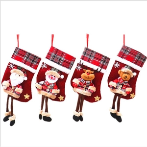 Set of 4 Christmas stockings with 3D Santa, Snowman, Reindeer, and Bear dolls