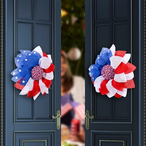 Patriotic July 4th American flag wreaths displayed on navy blue double front doors