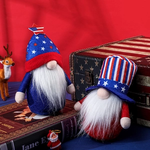 Detail of two patriotic gnomes with felt hats and long plush beards for Independence Day