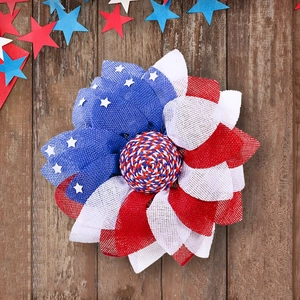 Patriotic 4th of July wreath with red white and blue burlap mesh and star accents