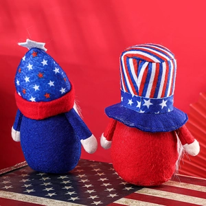 Handmade American Independence Day gnomes with stars and stripes on red festive background