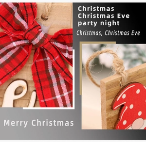 Close-up of wooden Christmas door sign with red gnome and plaid bow detail
